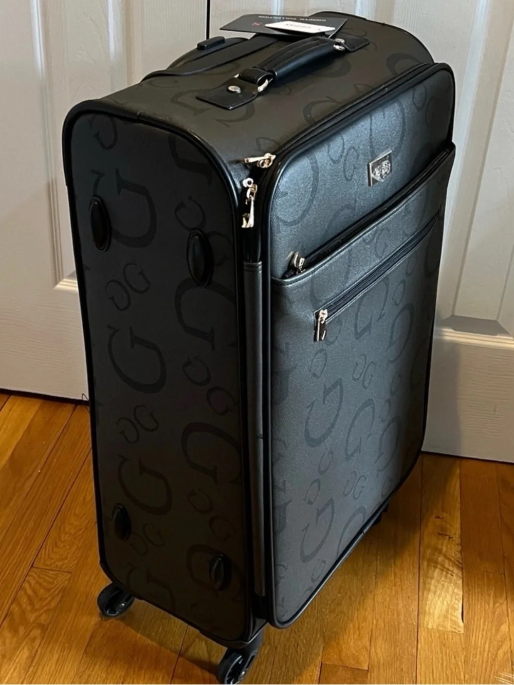 GUESS Logo Debossed Black Rolling Suitcase 24 “